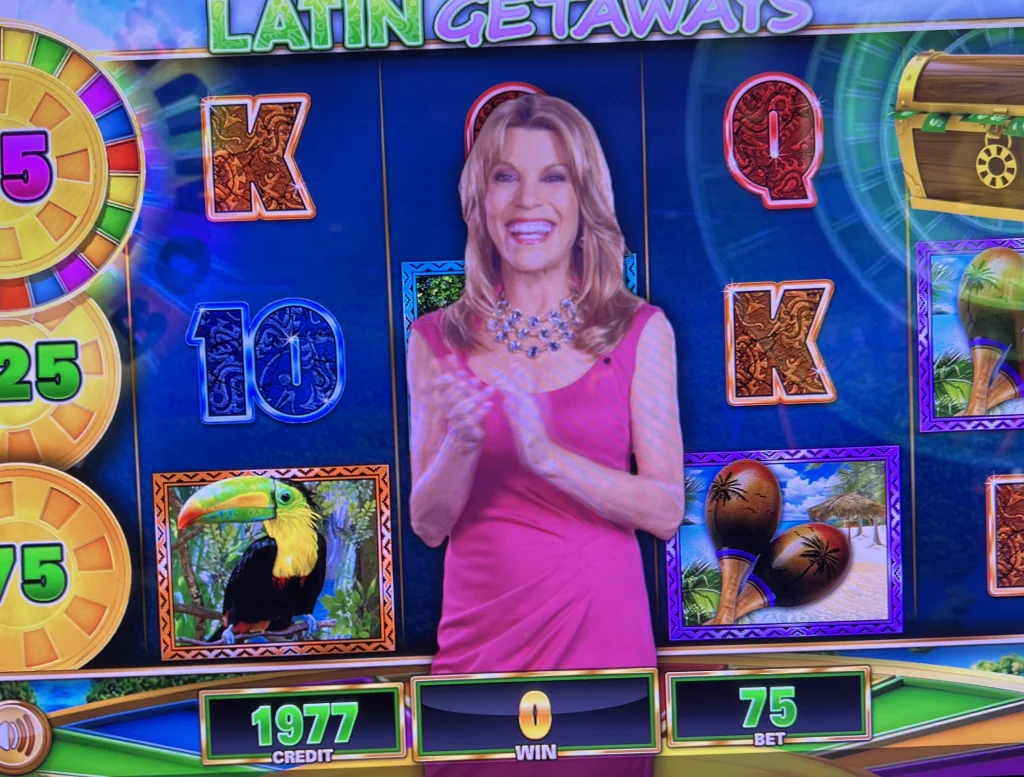 Vanna White on a Wheel of Fortune slot machine