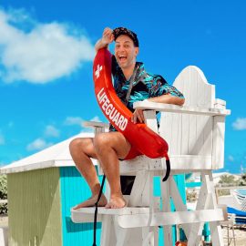 Brian Christopher on a lifeguard chair