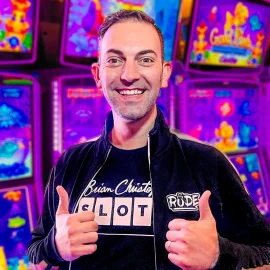 Brian Christopher thumbs up in a casino