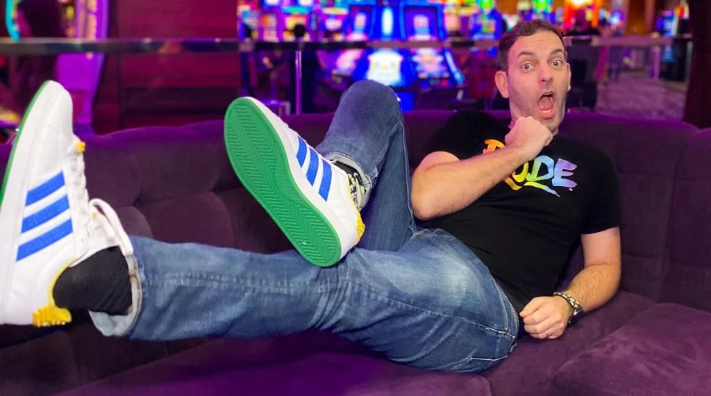 Brian sitting on a couch at the casino