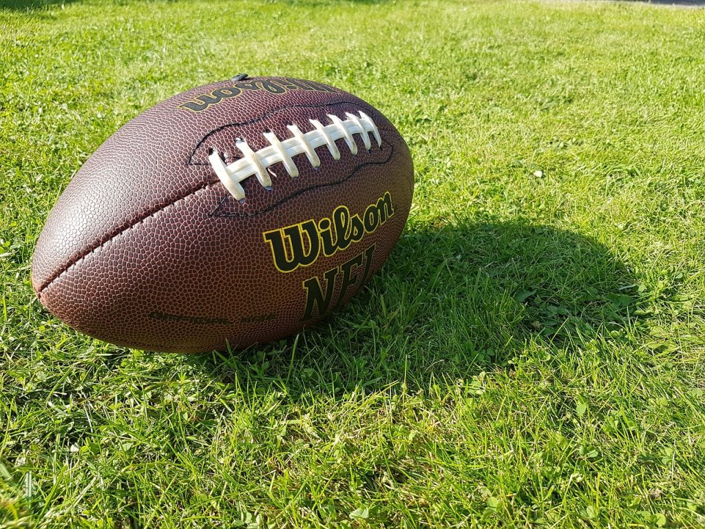 American football in the grass