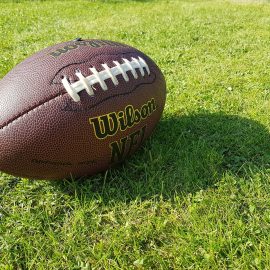 American football in the grass