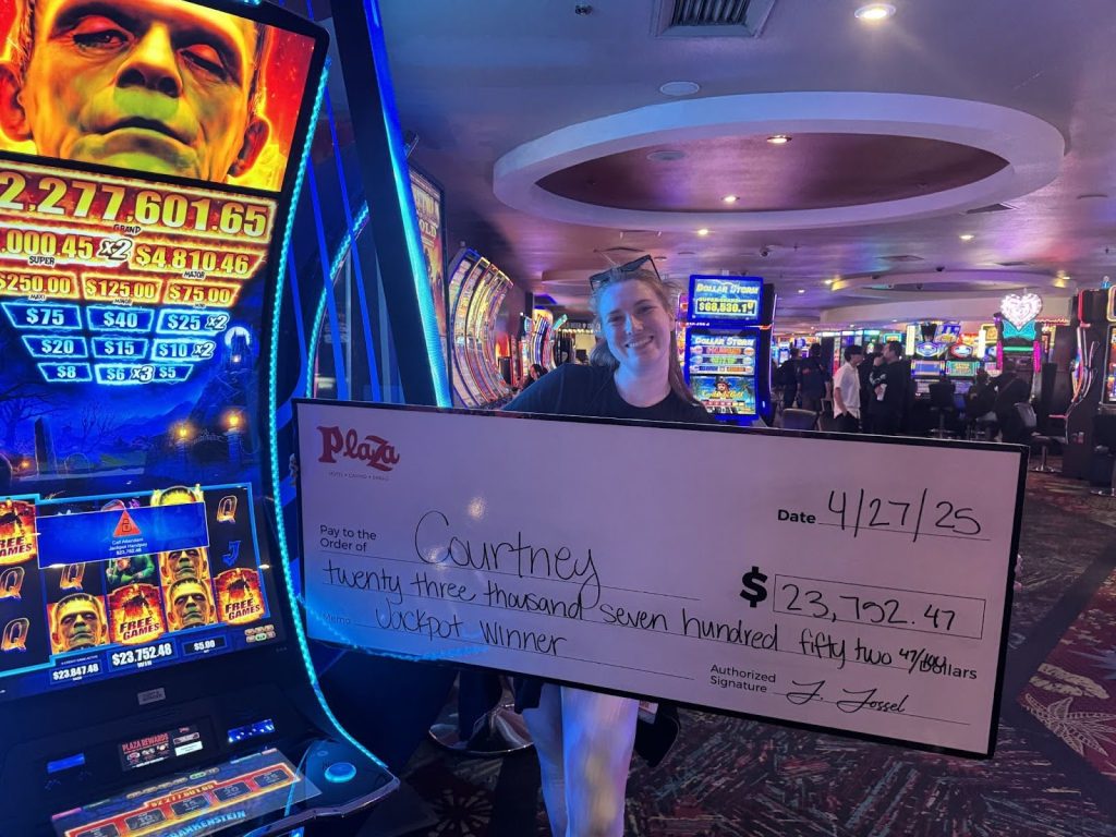 Courtney with big check