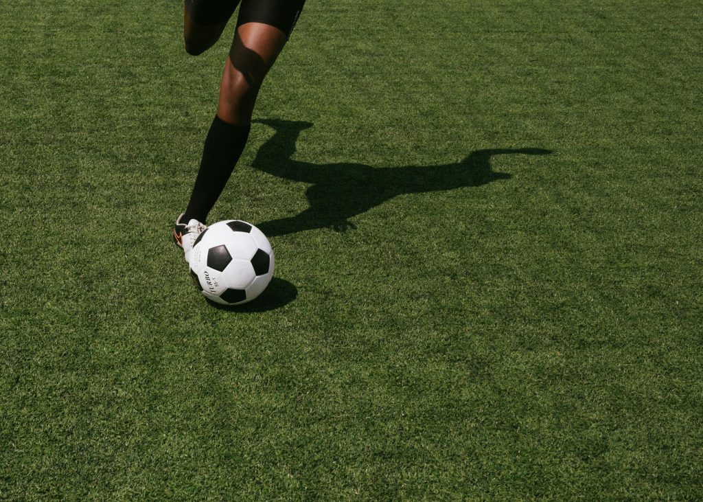 Kicking a soccer ball