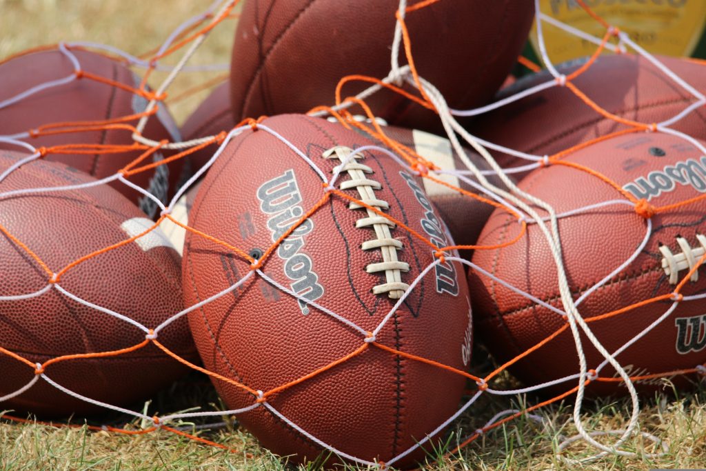Footballs in a net