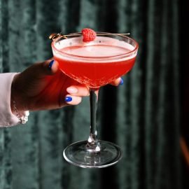 hand holding a cocktail