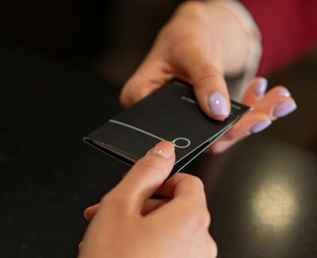 handing over a card