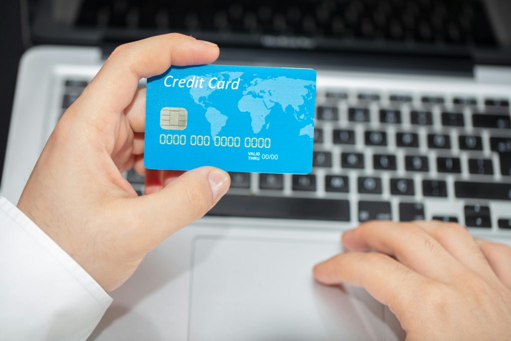 Credit Card in front of a computer