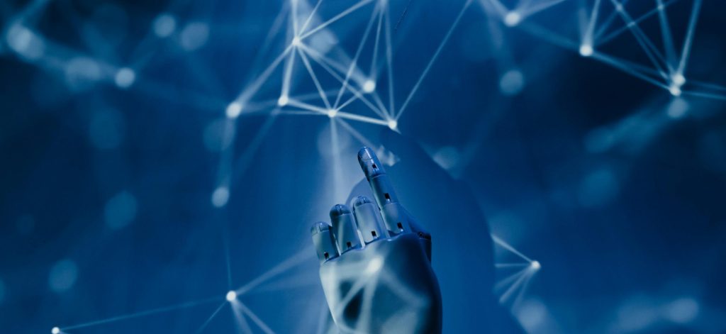 robot hand on digital background